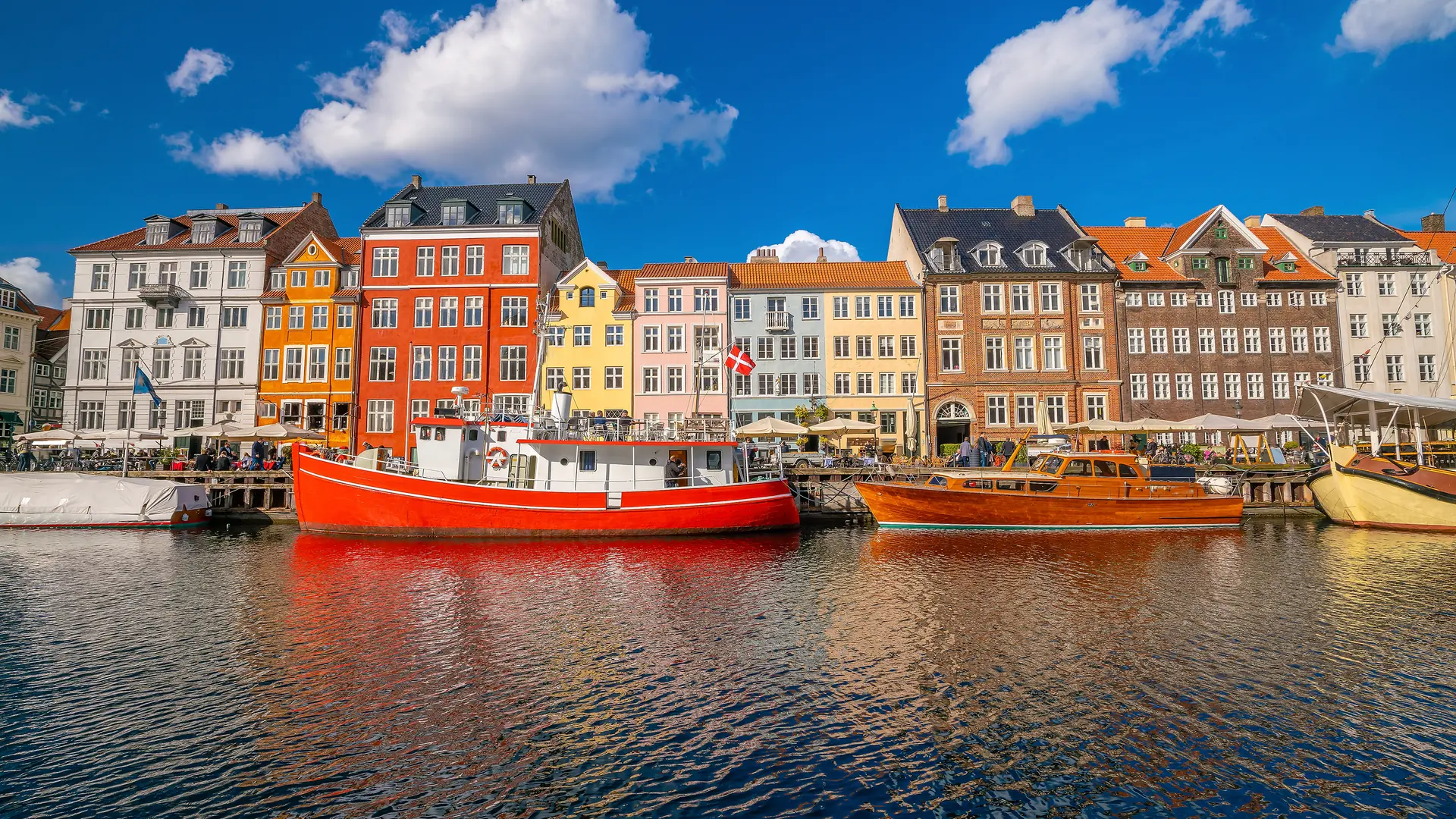 Cityscape of downtown Copenhagen city skyline in Denmark at famous old Nyhavn port