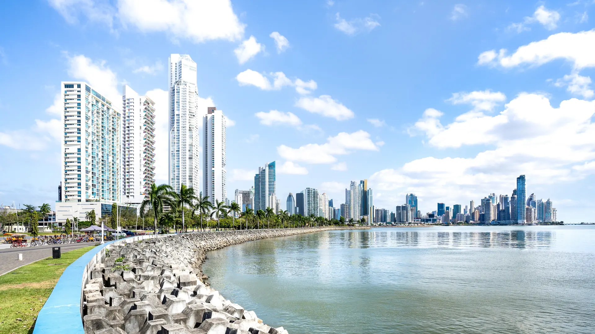 Panorama view of modern skyline at Panama City waterfront - International metropolis concept with highrise buildings and beach boardwalk at central america capital place - Bright vivid sunny filter