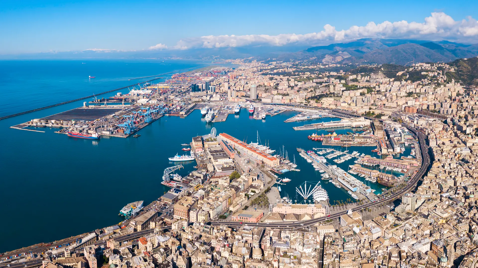 Genoa port aerial panoramic view. Genoa or Genova is the capital of Liguria region in Italy.