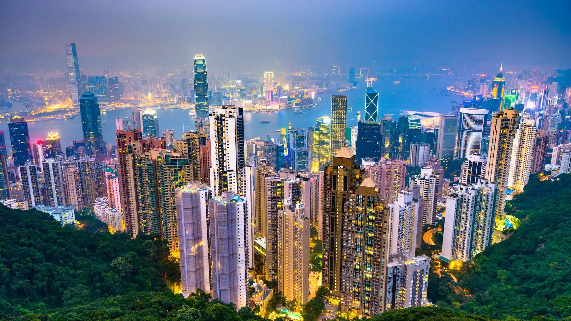 Hong Kong, China city skyline from Victoria Peak at night.