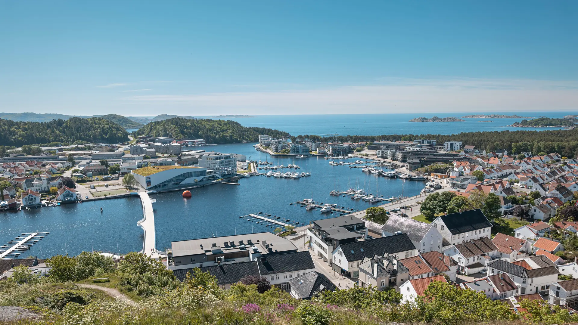 An aerial view of the city of Mandal, Norway near the water