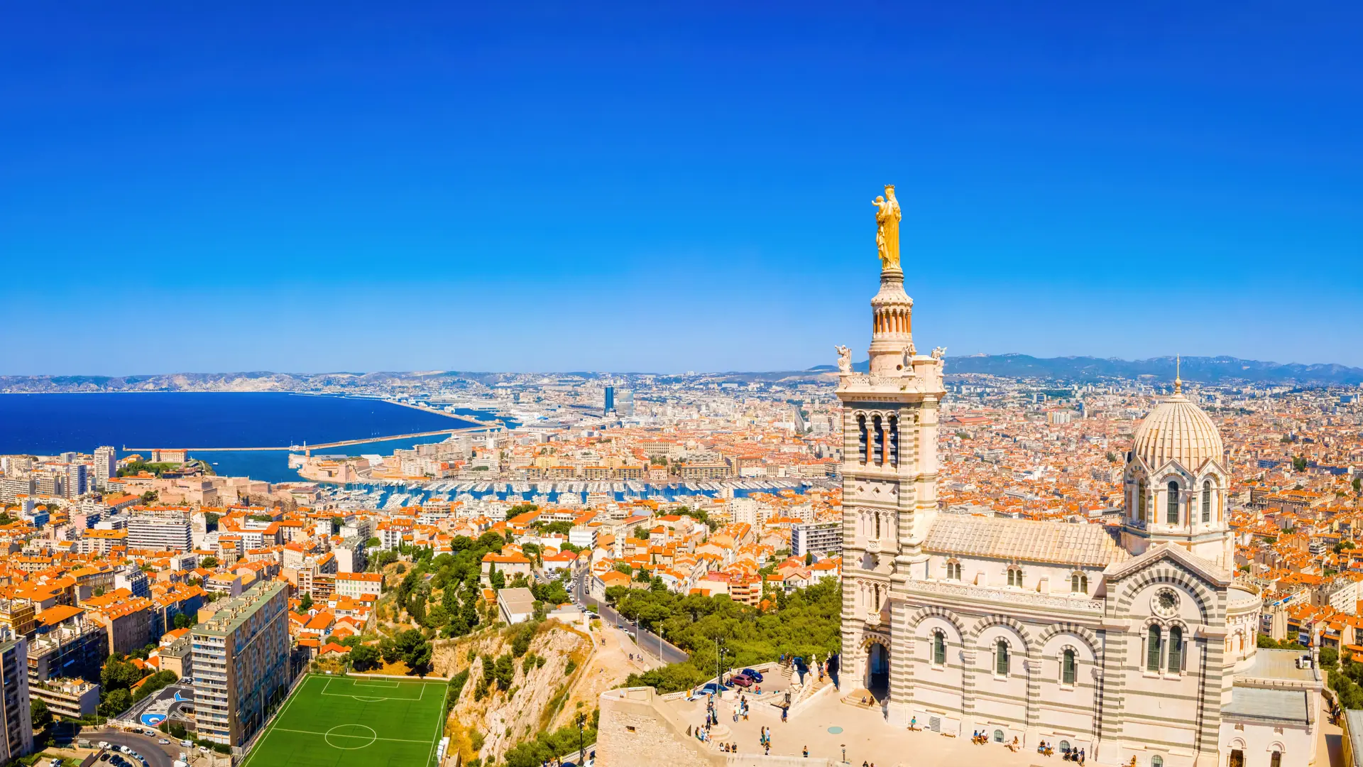 The aerial view of Basilique Notre-Dame-de-la-Garde in Marseille, a port city in southern France