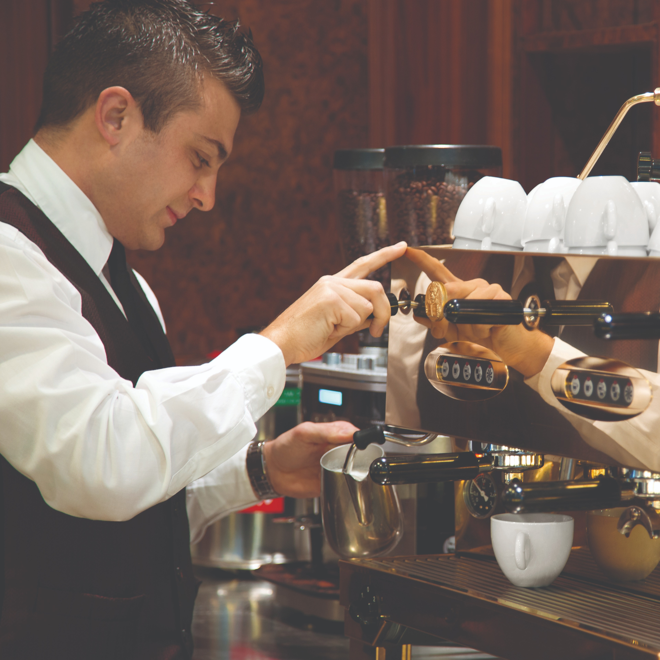 Barista at Espresso Machine