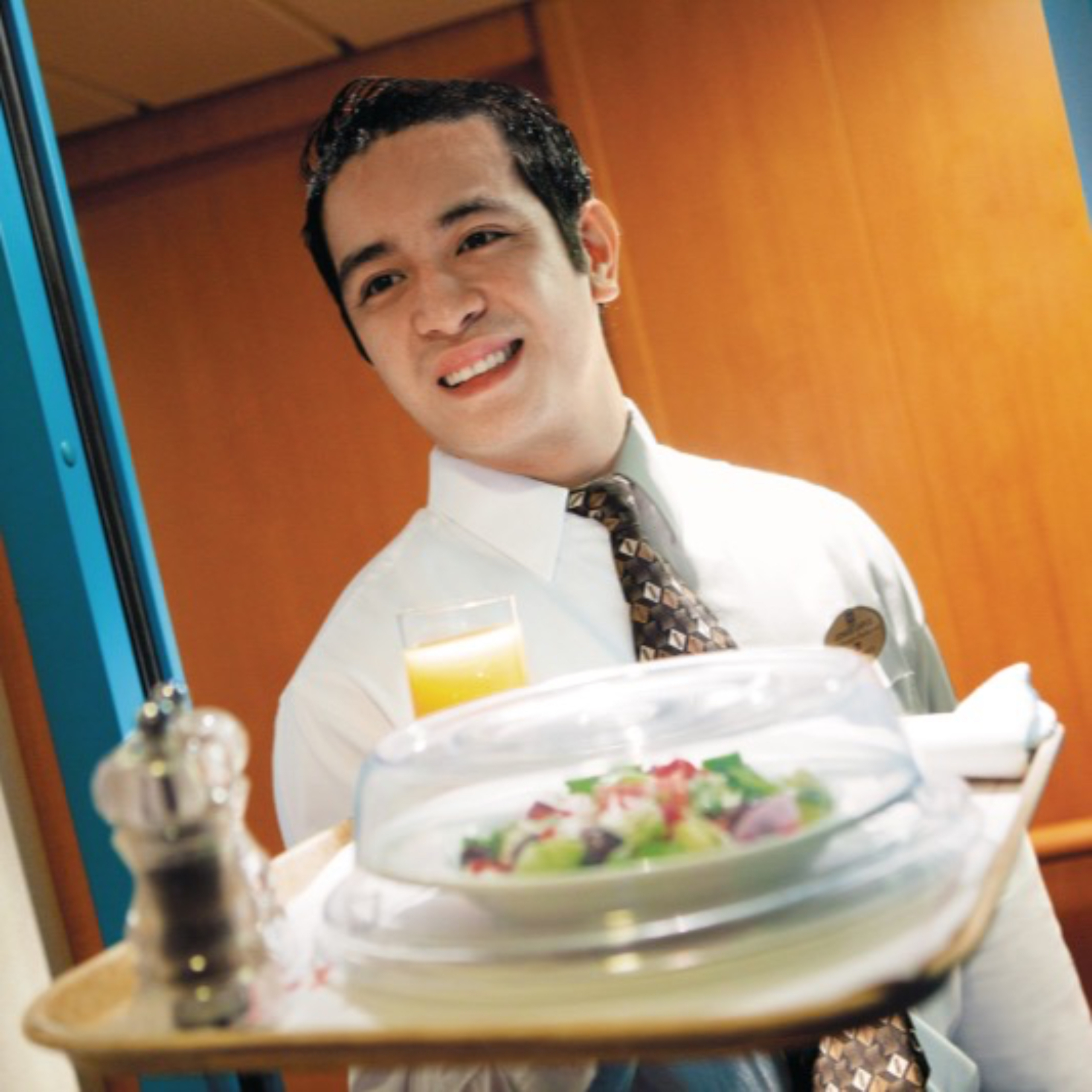 Waiter delivering food