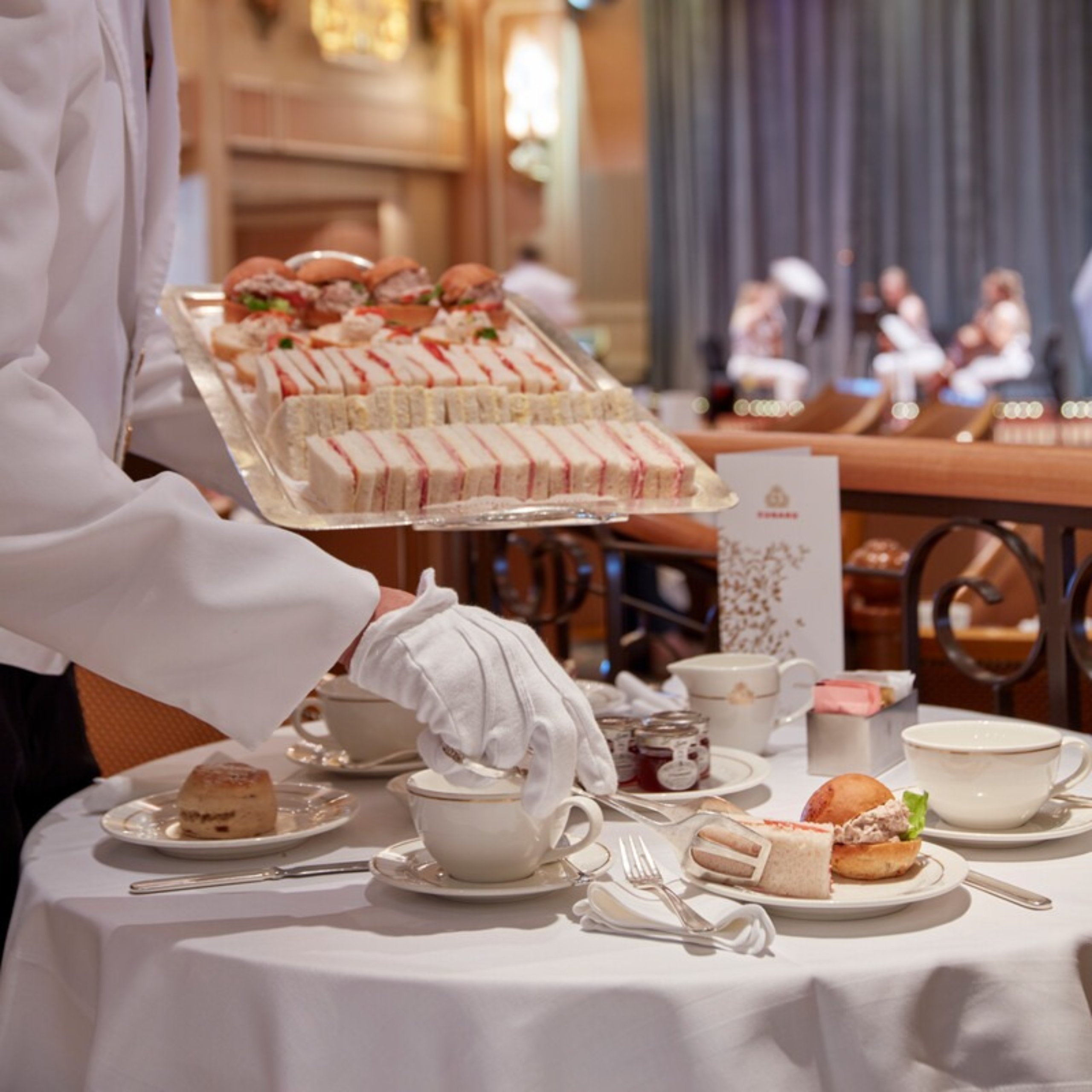 Waiter placing snacks